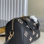 louis-vuitton-speedy-bandouliere-25-bicolor-monogram-empreinte-leather-handbags-M58947_PM2_Front-view-1.png