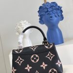 louis-vuitton-madeleine-bb-bicolor-monogram-empreinte-leather-handbags-M45978_PM2_Front-view.png