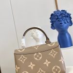 louis-vuitton-madeleine-mm-bicolor-monogram-empreinte-leather-handbags-M46041_PM2_Front-view.png