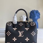 louis-vuitton-speedy-bandouliere-25-bicolor-monogram-empreinte-leather-handbags-M58947_PM2_Front-view-1.png