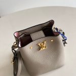 louis-vuitton-nano-lockme-bucket-lockme-leather-small-leather-goods-M69205_PM2_Front-view.png