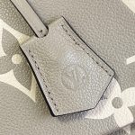 louis-vuitton-madeleine-mm-bicolor-monogram-empreinte-leather-handbags-M46041_PM2_Front-view.png