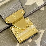 louis-vuitton-madeleine-mm-bicolor-monogram-empreinte-leather-handbags-M46041_PM2_Front-view.png