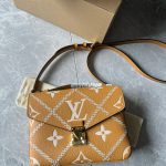 louis-vuitton-pochette-metis-monogram-empreinte-leather-handbags-M46018_PM2_Front-view.png