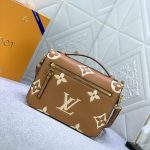 louis-vuitton-pochette-metis-bicolor-monogram-empreinte-leather-handbags-M45809_PM2_Front-view.png